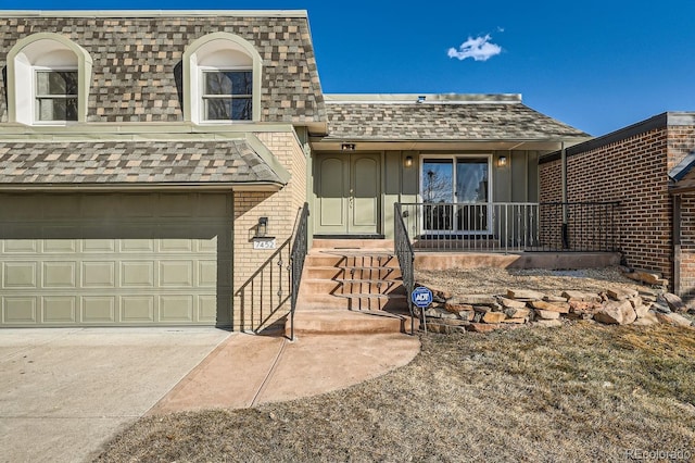 view of front of property featuring a garage