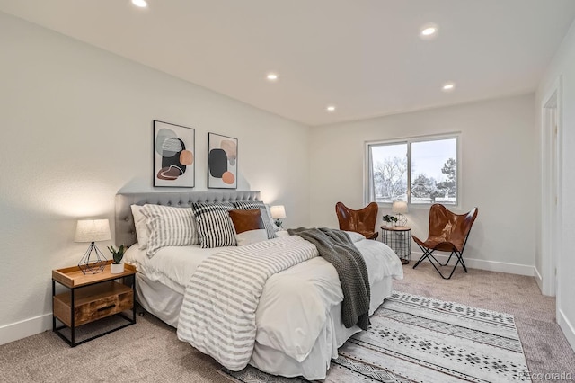 bedroom featuring light carpet