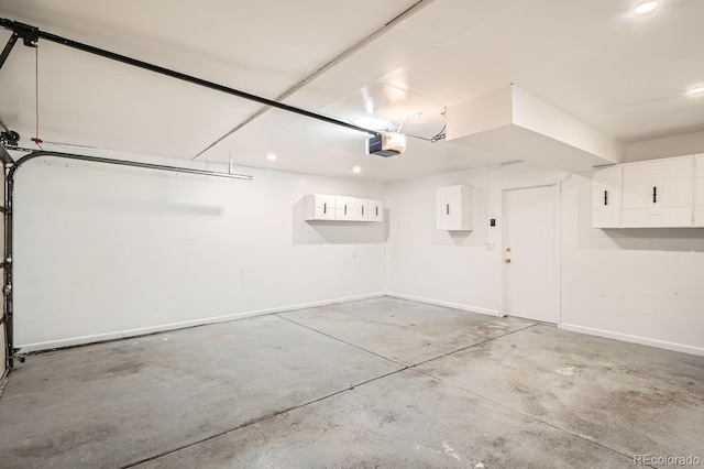 garage featuring a garage door opener