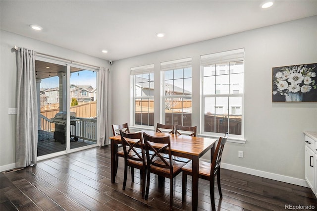 dining space with dark wood-style floors, visible vents, recessed lighting, and baseboards