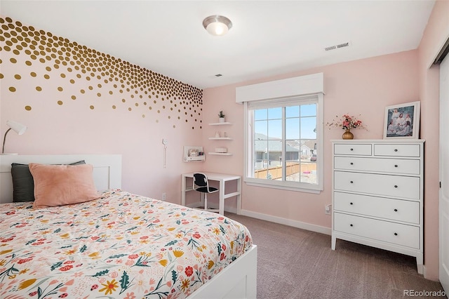 bedroom featuring carpet, visible vents, and baseboards