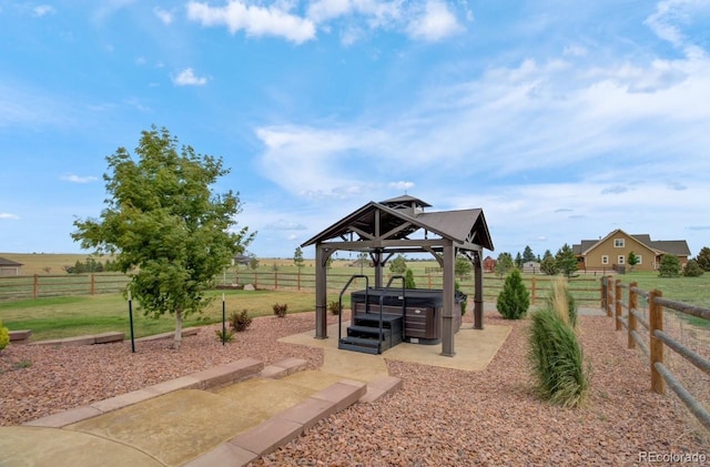 view of jungle gym featuring a gazebo and a rural view