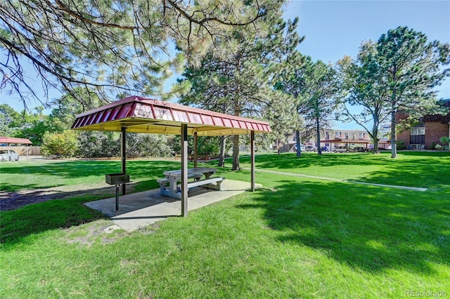 view of home's community with a yard and a gazebo