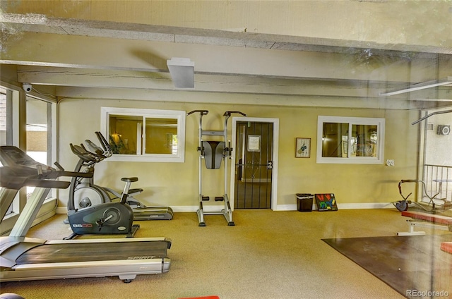 workout area with carpet and baseboards