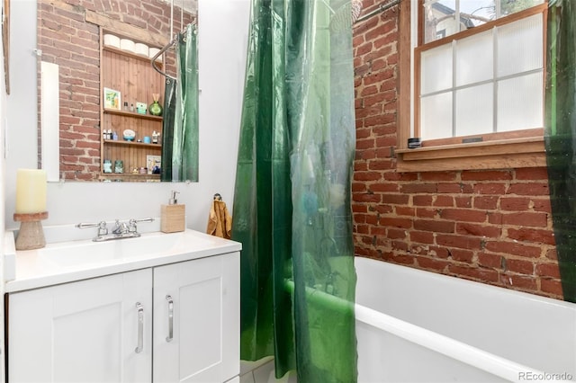 1776 S Logan St, Denver, CO 80210 - bathroom with vanity, brick wall, and shower / bath combo with shower curtain