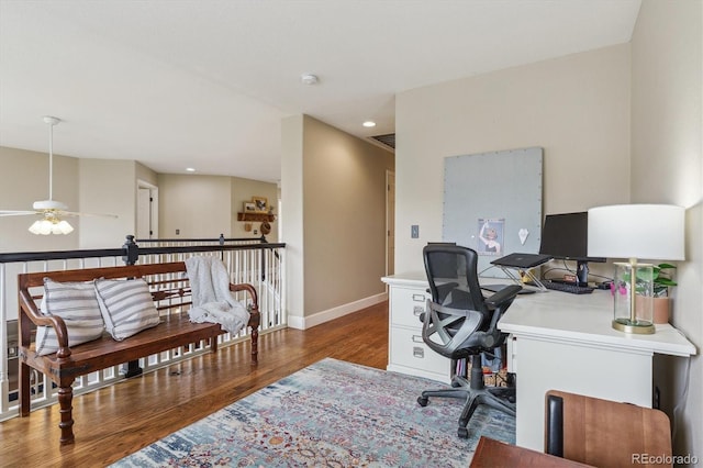 home office with a ceiling fan, recessed lighting, baseboards, visible vents, and wood finished floors