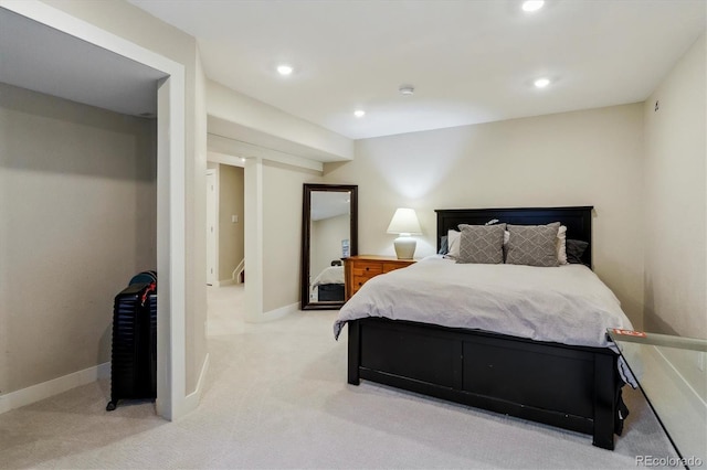 bedroom with light carpet, baseboards, and recessed lighting