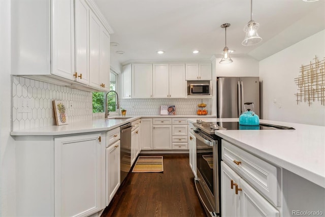 6488 S Heritage Pl E, Centennial, CO 80111 - kitchen featuring appliances with stainless steel finishes, a sink, white cabinetry, light countertops, and recessed lighting