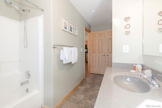 bathroom with vanity, tile patterned floors, and bathing tub / shower combination