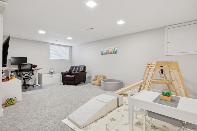 interior space featuring recessed lighting and carpet