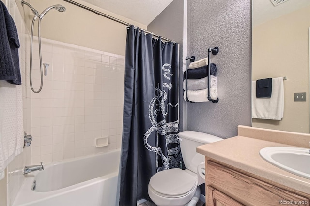 full bathroom with shower / tub combo with curtain, vanity, and toilet