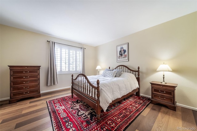 bedroom featuring wood-type flooring