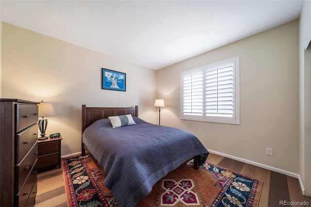 bedroom featuring light wood-type flooring