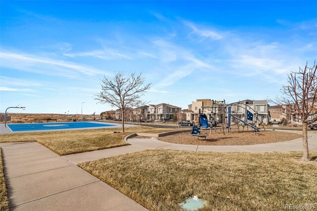 view of playground featuring a yard