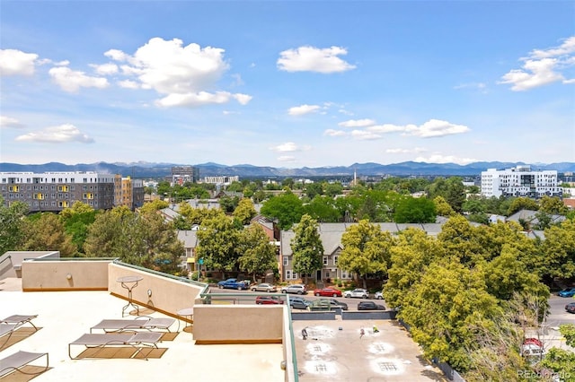 birds eye view of property featuring a mountain view