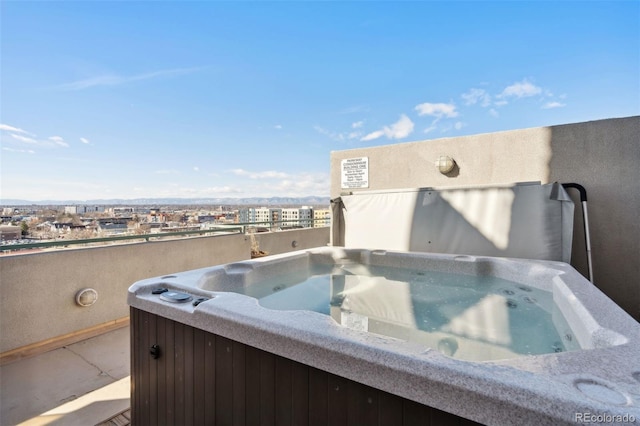 exterior space featuring a hot tub