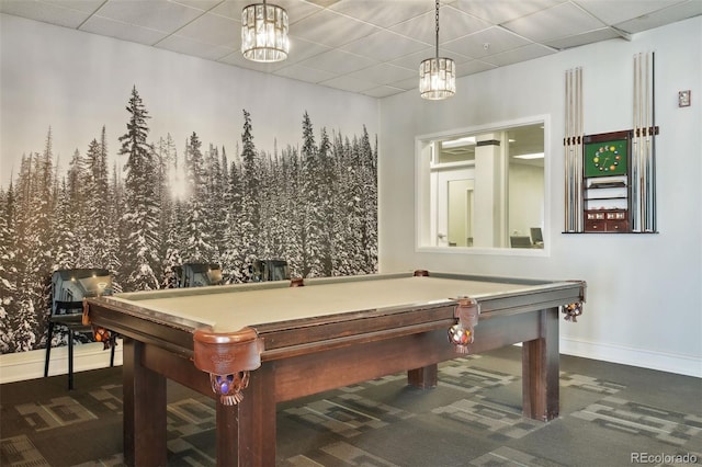 recreation room with a paneled ceiling, dark carpet, and billiards