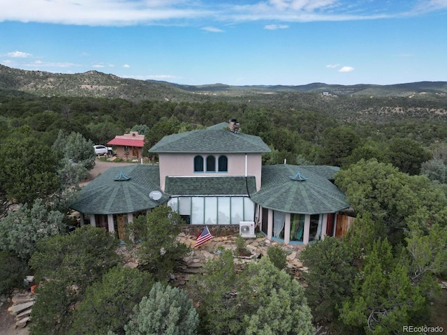 drone / aerial view featuring a mountain view