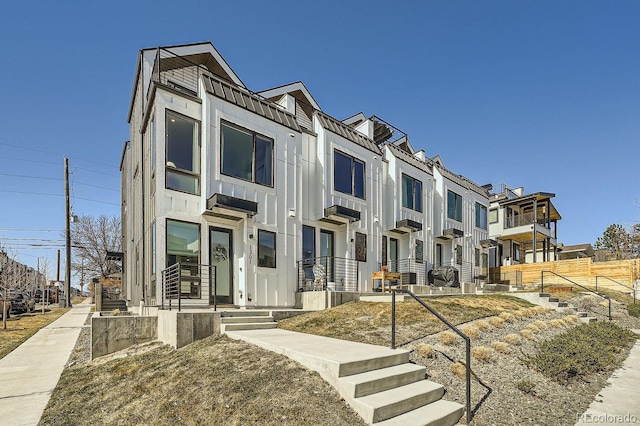 multi unit property with a residential view and stucco siding