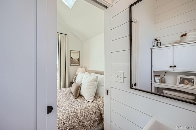 bedroom featuring vaulted ceiling