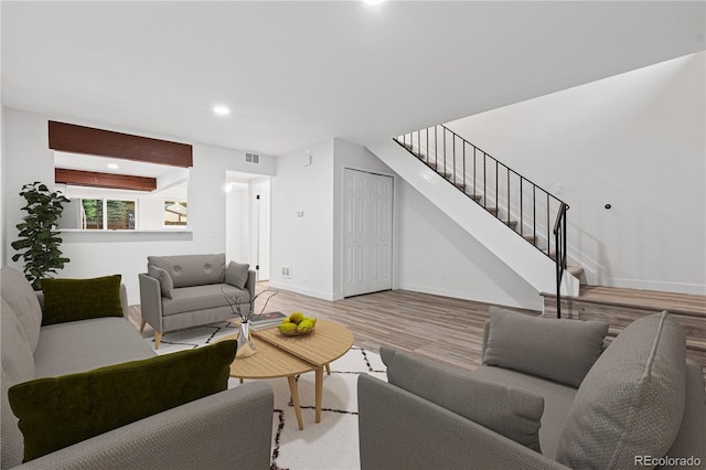 1347 S Crystal Way, Aurora, CO 80012 - living area with stairs, wood finished floors, baseboards, and recessed lighting