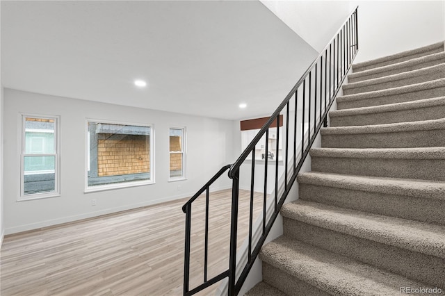 1347 S Crystal Way, Aurora, CO 80012 - stairs with wood finished floors, baseboards, and recessed lighting