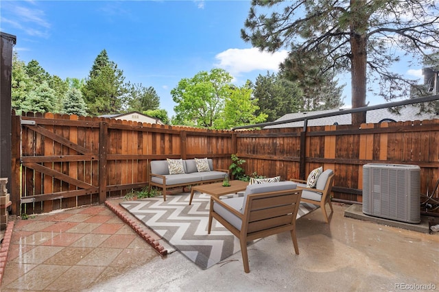 1347 S Crystal Way, Aurora, CO 80012 - fenced backyard featuring cooling unit, a patio, and an outdoor living space