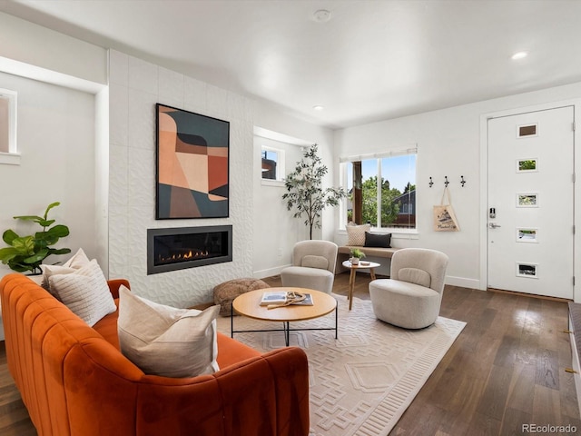 3640 Lipan St, Denver, CO 80211 - living room with a tiled fireplace, dark wood-type flooring, baseboards, and recessed lighting