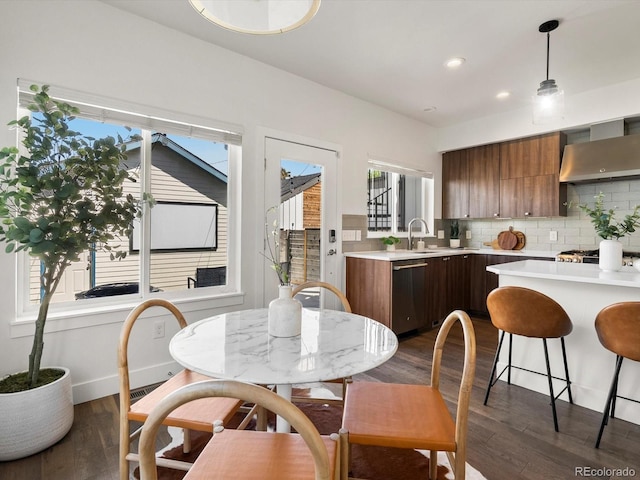 3640 Lipan St, Denver, CO 80211 - dining room with dark wood-type flooring, healthy amount of natural light, recessed lighting, and baseboards