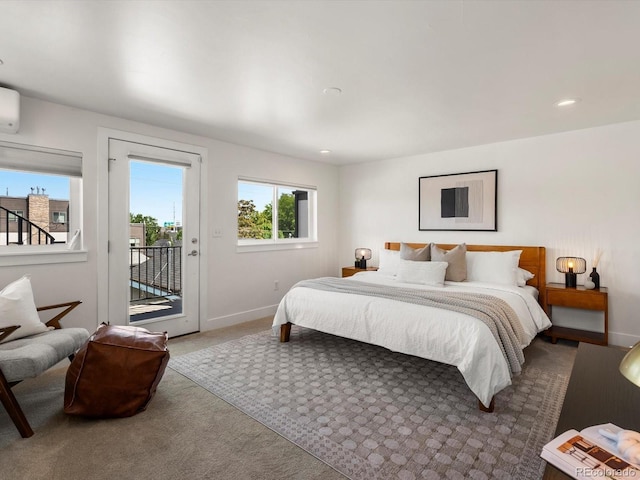 3640 Lipan St, Denver, CO 80211 - carpeted bedroom featuring access to outside, baseboards, a wall unit AC, and recessed lighting