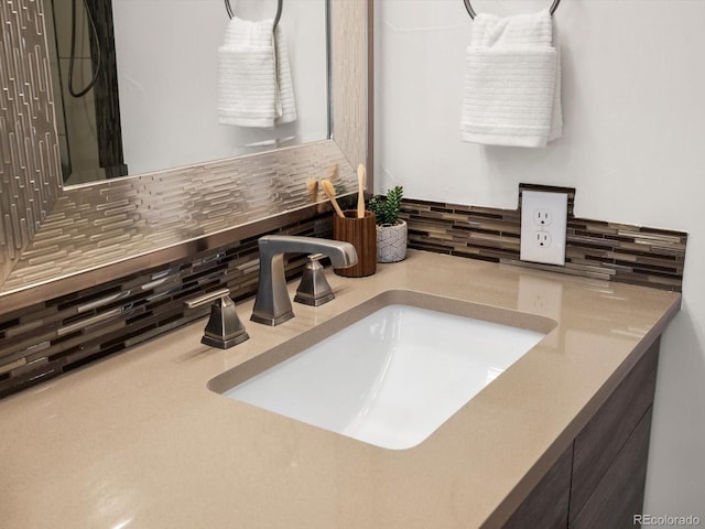 3640 Lipan St, Denver, CO 80211 - bathroom view of tasteful backsplash and vanity