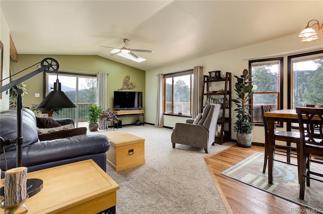 234 Bailey Dr, Bailey, CO 80421 - carpeted living room featuring a ceiling fan, lofted ceiling, and baseboards