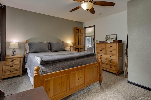 234 Bailey Dr, Bailey, CO 80421 - bedroom with light colored carpet and a ceiling fan