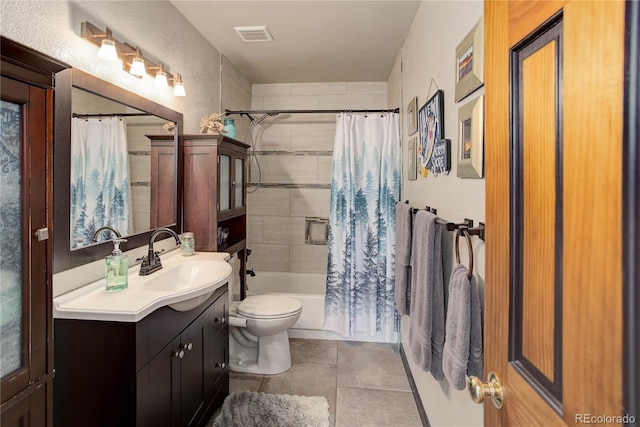 234 Bailey Dr, Bailey, CO 80421 - bathroom featuring toilet, vanity, shower / tub combo, and tile patterned flooring