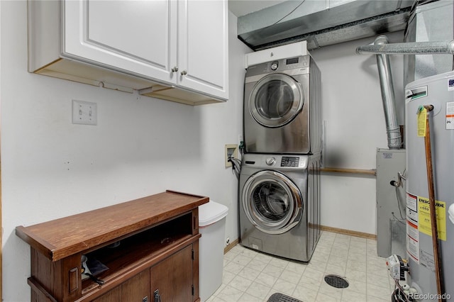 234 Bailey Dr, Bailey, CO 80421 - washroom with stacked washer and clothes dryer, water heater, cabinet space, and light flooring