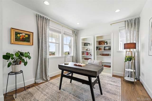 1601 Mariah Ln, Erie, CO 80516 - office featuring baseboards, recessed lighting, and wood finished floors