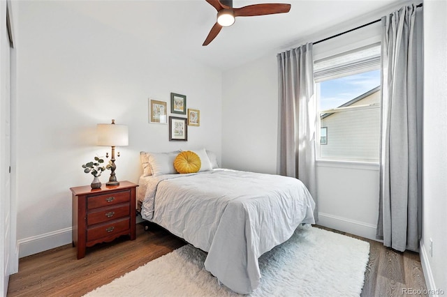 1601 Mariah Ln, Erie, CO 80516 - bedroom with wood finished floors, baseboards, and a ceiling fan