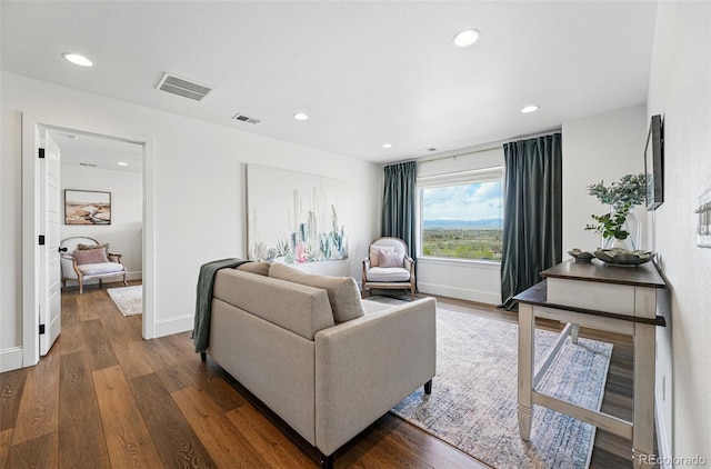 1601 Mariah Ln, Erie, CO 80516 - living room with wood finished floors, recessed lighting, and baseboards