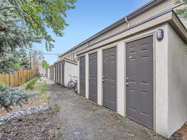 2460 W Caithness Pl Unit 105, Denver, CO 80211 - garage featuring fence