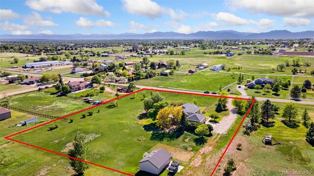 15132 Pecos St, Broomfield, CO 80023 - aerial overview of property's location featuring property boundaries highlighted and a mountain backdrop