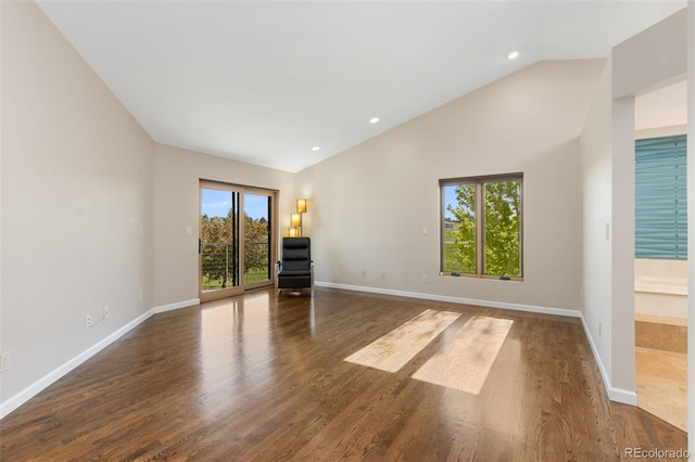 15132 Pecos St, Broomfield, CO 80023 - empty room featuring baseboards, dark wood-style flooring, recessed lighting, and high vaulted ceiling