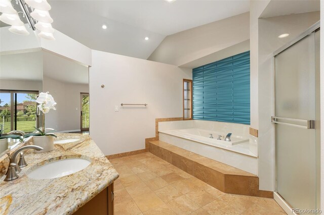 15132 Pecos St, Broomfield, CO 80023 - bathroom featuring a chandelier, double vanity, a garden tub, a stall shower, and vaulted ceiling