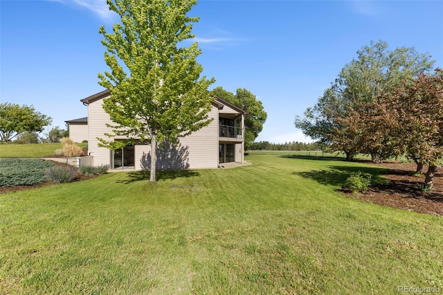 15132 Pecos St, Broomfield, CO 80023 - view of grassy yard with a balcony