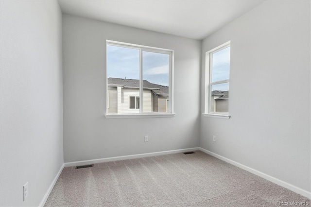 453 Interlocken Blvd Unit 101, Broomfield, CO 80021 - empty room with baseboards, visible vents, and carpet