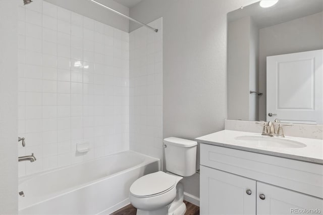 453 Interlocken Blvd Unit 101, Broomfield, CO 80021 - bathroom with toilet, shower / bathing tub combination, vanity, and wood finished floors