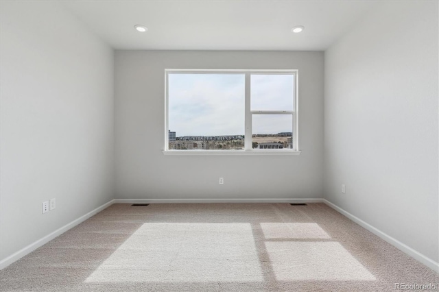 453 Interlocken Blvd Unit 101, Broomfield, CO 80021 - spare room featuring baseboards, visible vents, recessed lighting, and carpet