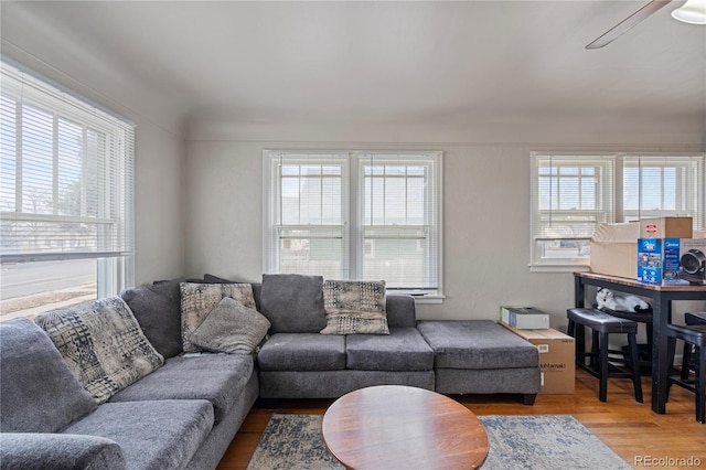 2041 7th Ave, Greeley, CO 80631 - living area with healthy amount of natural light, wood finished floors, and ceiling fan
