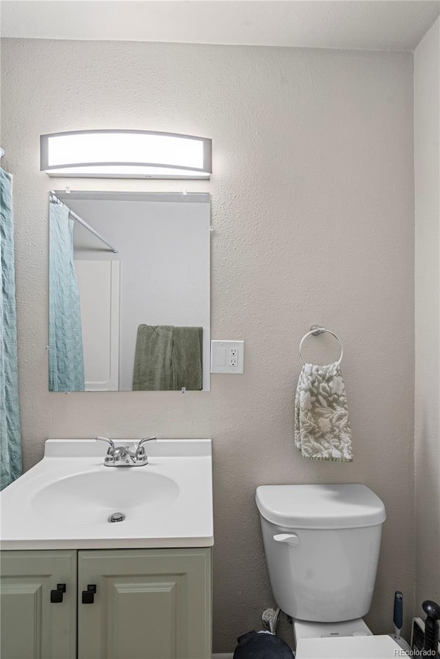 2041 7th Ave, Greeley, CO 80631 - bathroom featuring toilet and vanity