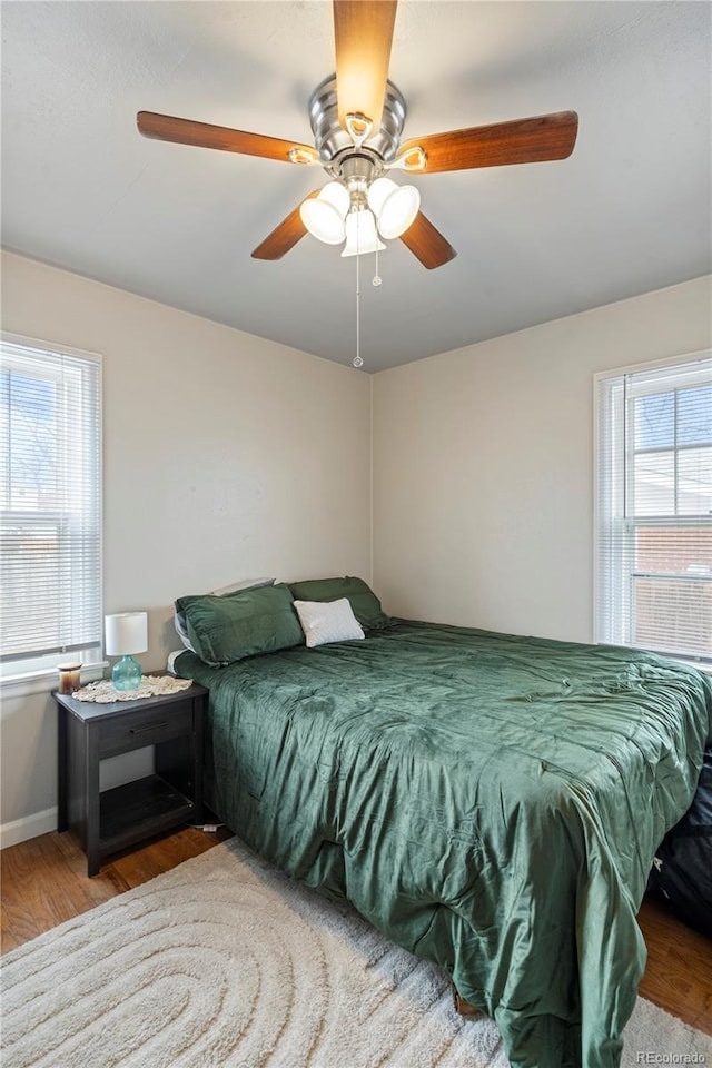 2041 7th Ave, Greeley, CO 80631 - bedroom with wood finished floors and ceiling fan