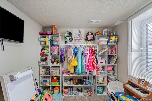 2041 7th Ave, Greeley, CO 80631 - playroom with a textured ceiling